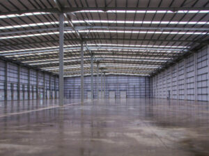 Newly polished floor in a warehouse How Can I Remove Scratches from Polished Concrete Flooring